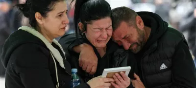 Families and friends grieve for victims at the main square following a fire at the Pulse nightclub that resulted in dozens of deaths in the town of Kocani, North Macedonia, March 18, 2025. REUTERS/Alexandros Avramidis