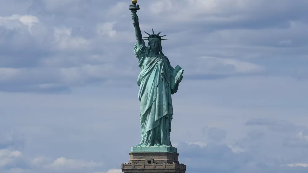 FILE - The Statue of Liberty is seen from the Staten Island Ferry, Monday, Sept. 9, 2024, in New York. (AP Photo/Pamela Smith, file)