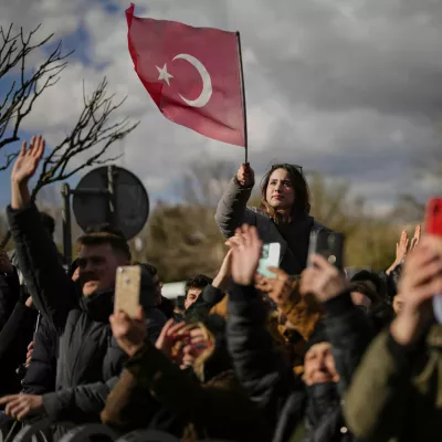 People gather outside the City Hall to protest the arrest of Istanbul Mayor Ekrem Imamoglu in Istanbul, Turkey, Wednesday, March 19, 2025. (AP Photo/Emrah Gurel)