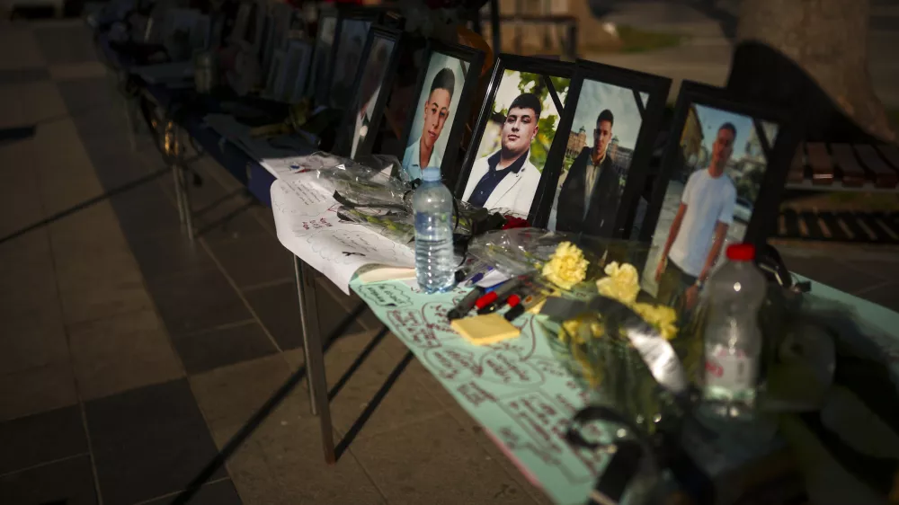 Photographs of the victims of a massive nightclub fire are displayed at a square in Kocani, North Macedonia, Thursday, March 20, 2025. (AP Photo/Armin Durgut)