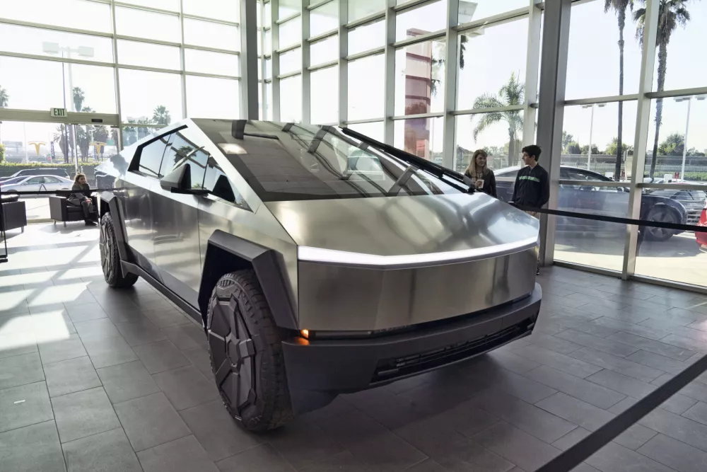 FILE - A Tesla Cybertruck is on display at the Tesla showroom in Buena Park, Calif., Dec. 3, 2023. (AP Photo/Richard Vogel, File)