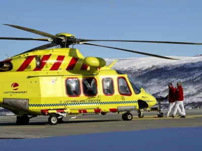 This picture shows a helicopter at the landing area of the University Hospital in Tromsoe, where the injured person during an avalanche was taken, and where the five bodies are being kept, on March 20, 2012 in Tromso. Five people died after an avalanche hit an expedition of Swiss nationals led by a French guide on a mountain in northern Norway. AFP PHOTO DANIEL SANNUM LAUTEN,Image: 121844547, License: Rights-managed, Restrictions:, Model Release: noFoto: Profimedia