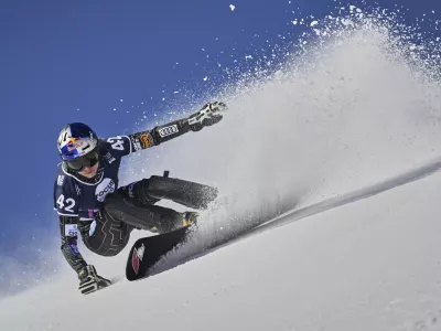 Czech Republic's Ester Ledecka in action at the Snowboard Parallel Giant Slalom event at the Freestyle World Championships, in St. Moritz, Switzerland, Thursday, March 20, 2025. (Gian Ehrenzeller/Keystone via AP)