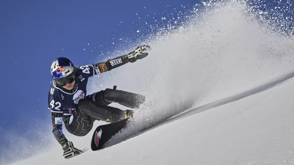 Czech Republic's Ester Ledecka in action at the Snowboard Parallel Giant Slalom event at the Freestyle World Championships, in St. Moritz, Switzerland, Thursday, March 20, 2025. (Gian Ehrenzeller/Keystone via AP)