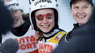 21 March 2025, Finland, Lahti: Slovenia's Nika Prevc celebrates with her team mates after winning the women's HS130 ski jumping competition at the FIS Nordic World Cup in Lahti. Photo: Pepe Korteniemi/Lehtikuva/dpa