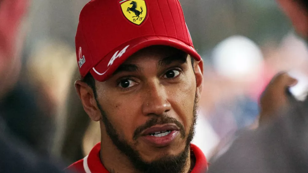 Formula One F1 - Chinese Grand Prix - Shanghai International Circuit, Shanghai, China - March 23, 2025 Ferrari's Lewis Hamilton is interviewed after finishing sixth place in the Chinese Grand Prix REUTERS/Go Nakamura