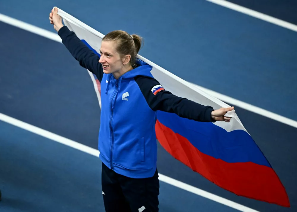 Athletics - World Athletics Indoor Championships - Nanjing Youth Olympic Sports Park, Nanjing, China - March 22, 2025 Slovenia's Tina Sutej celebrates after finishing second in the women's pole vault final REUTERS/Dylan Martinez