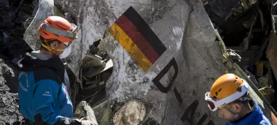 FILE - In this photo taken on March 31, 2015 and provided by the French Interior Ministry, French emergency rescue services work among the debris of the Germanwings passenger jet at the crash site near Seyne-les-Alpes, France. (Yves Malenfer/Ministere de l'Interieur, File)