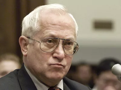 FILE - In this Oct. 26, 1999 file photo, Oleg Gordievsky, a former deputy head of the KGB in London, prepares to testify before a House Armed Services Subcommittee in Washington. He died March 4 in England at the age of 86. (AP Photo/Dennis Cook, File)