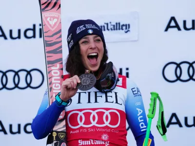 Mar 23, 2025; Sun Valley, ID, USA; Federica Brignone of Italy celebrates on the podium after the Super G alpine skiing race in the 2025 FIS Ski World Cup at Sun Valley. Mandatory Credit: Christopher Creveling-Imagn Images