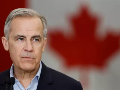 Canada's Prime Minister Mark Carney, on the second day of his Liberal Party election campaign tour, takes part in a news conference at the Gander International Lounge in Gander, Newfoundland, Canada March 24, 2025. REUTERS/Blair Gable