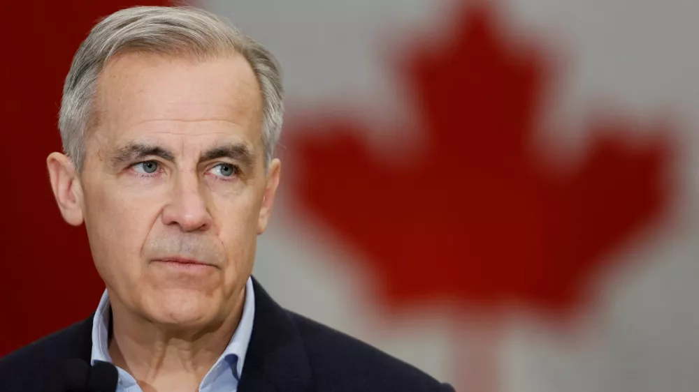 Canada's Prime Minister Mark Carney, on the second day of his Liberal Party election campaign tour, takes part in a news conference at the Gander International Lounge in Gander, Newfoundland, Canada March 24, 2025. REUTERS/Blair Gable