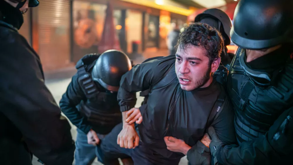 26 March 2025, Turkey, Ankara: Police detain a protester who participated in a demonstration against the arrest of the mayor of Istanbul, opposition politician Ekrem Imamoglu, from the Republican People's Party. Photo: Tunahan Turhan/SOPA Images via ZUMA Press Wire/dpa