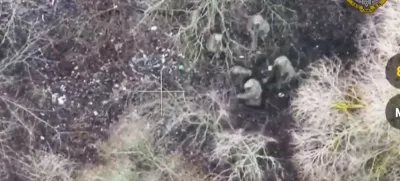 This image made from a video provided by Ukrainian Presidential Press Office on Jan. 11, 2025, shows Ukrainian forces capturing two North Korean soldiers fighting alongside Russian forces in Russia's Kursk border region. (Ukrainian Presidential Press Office via AP)