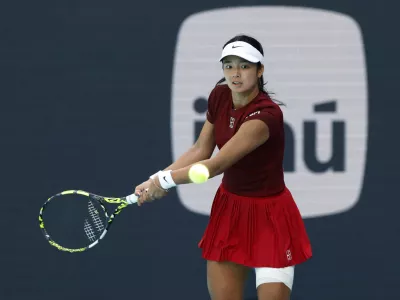 Mar 26, 2025; Miami, FL, USA; Alexandra Eala (PHL) hits a backhand against Iga Swiatek (POL)(not pictured) on day nine of the Miami Open at Hard Rock Stadium. Mandatory Credit: Geoff Burke-Imagn Images