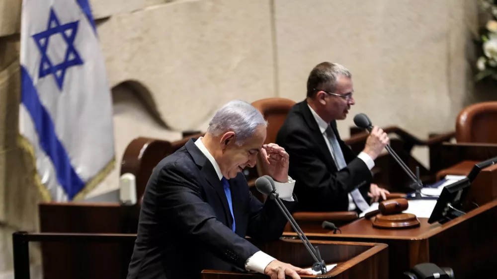 Israeli Prime Minister Benjamin speaks during a special session of the Knesset, Israel's parliament, to approve and swear-in a new coalition government, in Jerusalem June 13, 2021. REUTERS/Ronen Zvulun