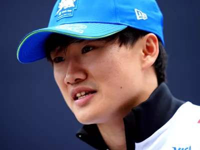 FILED - 16 May 2024, Italy, Imola: Japanese Formula 1 driver Yuki Tsunoda of the Scuderia AlphaTauri Racing Team arrives at the Autodromo Internazionale Enzo e Dino Ferrari race track, ahead of the Formula One Emilia Romagna Grand Prix. Red Bull confirmed on Thursday that Liam Lawson had been dropped after just two races, citing a "duty of care to protect" him. The team demoted Lawson to Racing Bulls, replacing him with Yuki Tsunoda for the Japanese driver's home race in Suzuka next Sunday. Photo: David Davies/PA Wire/dpa