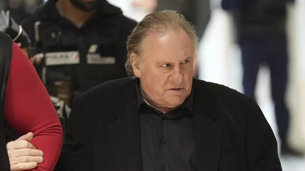 Actor Gerard Depardieu arrives at his trial for the alleged sexual assaults of two women on a film set in 2021, Thursday, March 27, 2025 in Paris. (AP Photo/Aurelien Morissard)
