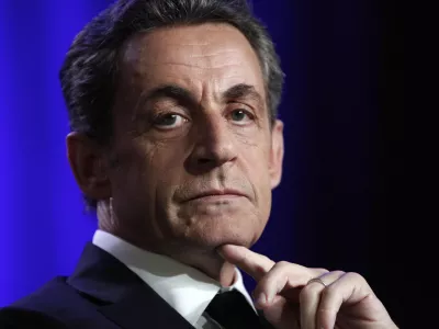 FILE - Former French President Nicolas Sarkozy attends a meeting in Asnieres, outside Paris, March 24 2015. (AP Photo/Thibault Camus, File)