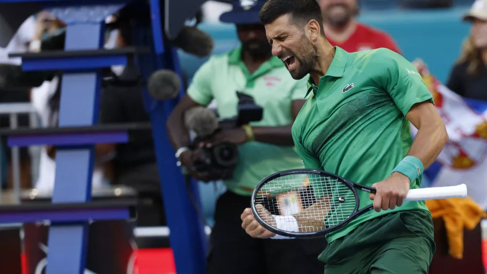 Mar 27, 2025; Miami, FL, USA; Novak Djokovic (SRB) celebrates after his match against Sebastian Korda (USA)(not pictured) in a men's singles quarterfinal on day ten of the Miami Open at Hard Rock Stadium. Mandatory Credit: Geoff Burke-Imagn Images