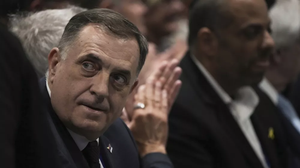 Bosnian Serb President Milorad Dodik, left, attends the International Conference on Combating Antisemitism, in Jerusalem, Thursday, March 27, 2025. (AP Photo/Leo Correa)
