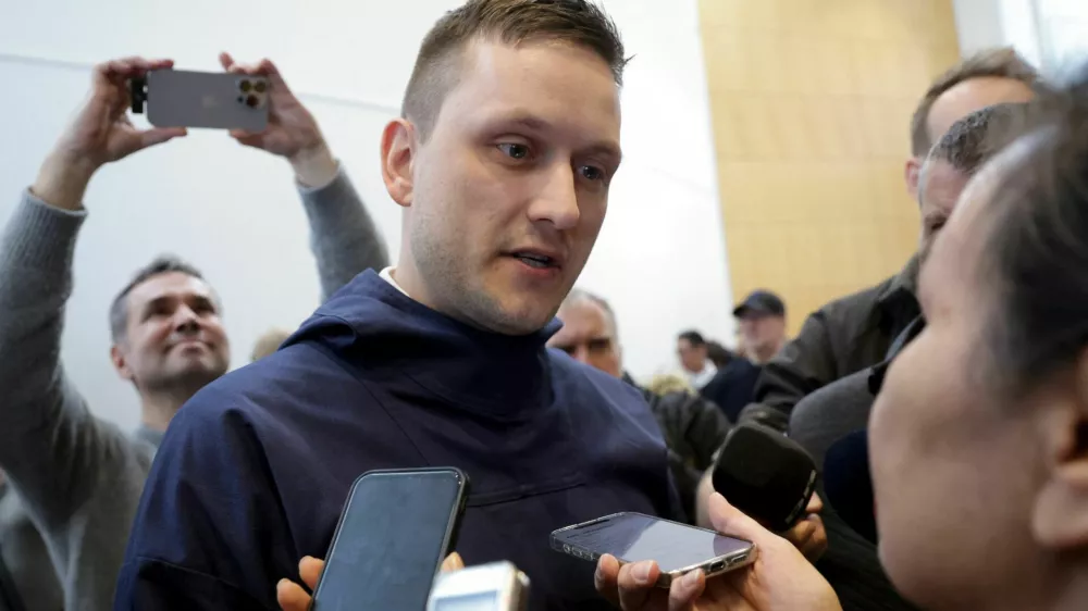 Leader of the Democrats (Demokraatit) party and Greenland's Prime Minister-elect Jens-Frederik Nielsen speaks to the media in Nuuk, Greenland, March 28, 2025. REUTERS/Leonhard Foeger