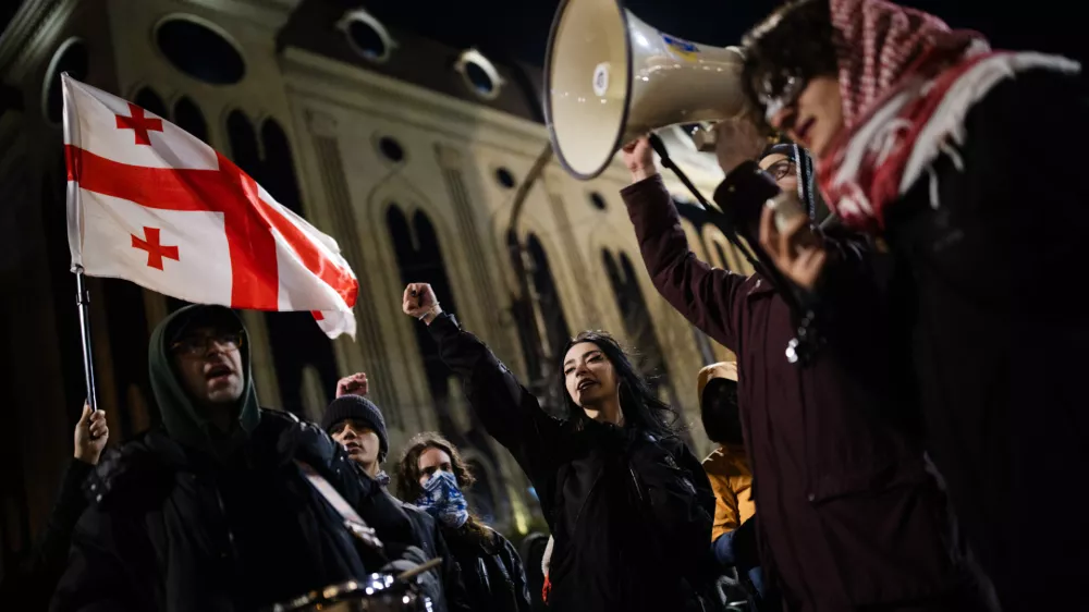 On March 23, 2025, in Tbilisi, Georgia, demonstrators march daily from the Public Broadcaster to the Parliament. They demand that the Public Broadcaster be returned to the public, that it broadcast fair and equitable information, and that state propaganda cease. (Photo by Sebastien Canaud/NurPhoto)NO USE FRANCE