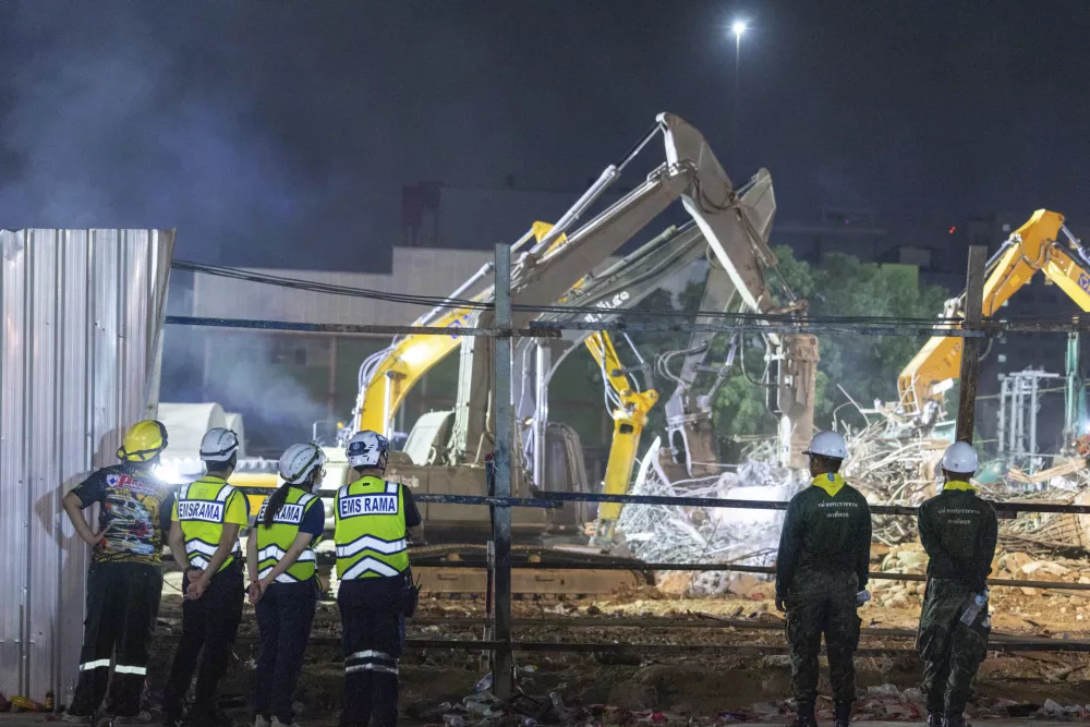 Rescuers work at the site of an under-construction high-rise building that collapsed after an earthquake in Bangkok, Thailand, Monday, March, 31, 2025. (AP Photo/Wason Wanichakorn)