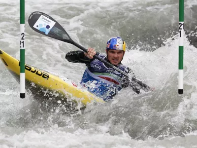 Canoeing - 2021 ECA Canoe Slalom European Championships, Ivrea, Italy - May 8, 2021 Slovenia's Peter Kauzer in action during the Men's Kayak (K1) final REUTERS/Alessandro Garofalo