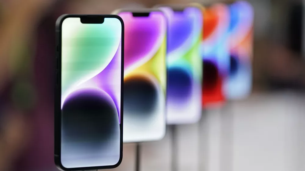 New iPhone 14 models on display at an Apple event on the campus of Apple's headquarters in Cupertino, Calif., Wednesday, Sept. 7, 2022. (AP Photo/Jeff Chiu)