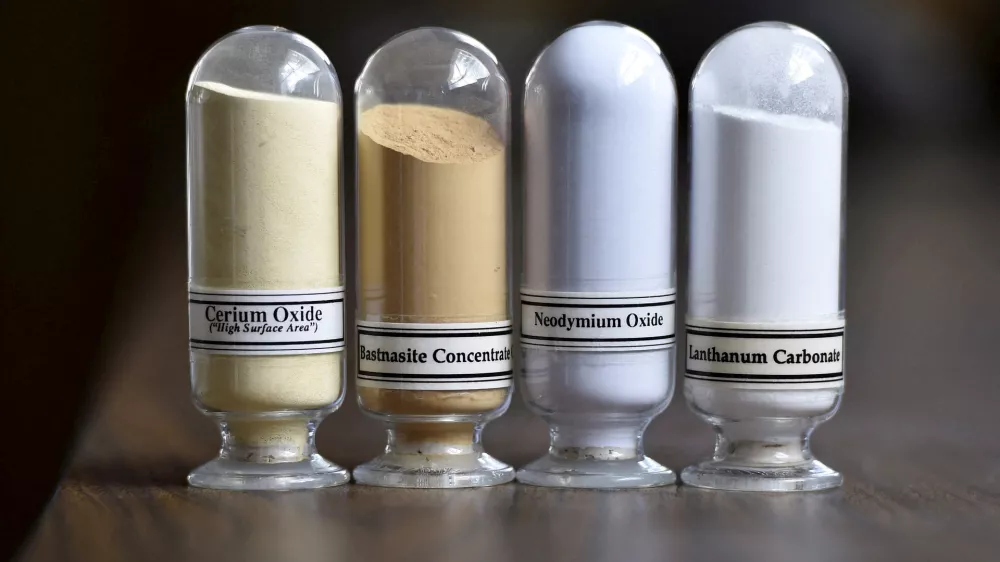 FILE PHOTO: Samples of rare earth minerals from left, Cerium oxide, Bastnasite, Neodymium oxide and Lanthanum carbonate are on display during a tour of Molycorp's Mountain Pass Rare Earth facility in Mountain Pass, California June 29, 2015. REUTERS/David Becker//File Photo