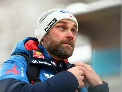 Ski Jumping - Four Hills Tournament - Bischofshofen, Austria - January 5, 2025 Austria mens national team head coach Andreas Widhoelzl is pictured on his way to training ahead of the event REUTERS/Lisi Niesner