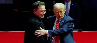 FILE PHOTO: U.S. President-elect Donald Trump greets Tesla CEO and X owner Elon Musk during a rally the day before Trump is scheduled to be inaugurated for a second term, in Washington, U.S., January 19, 2025. REUTERS/Brian Snyder/File Photo