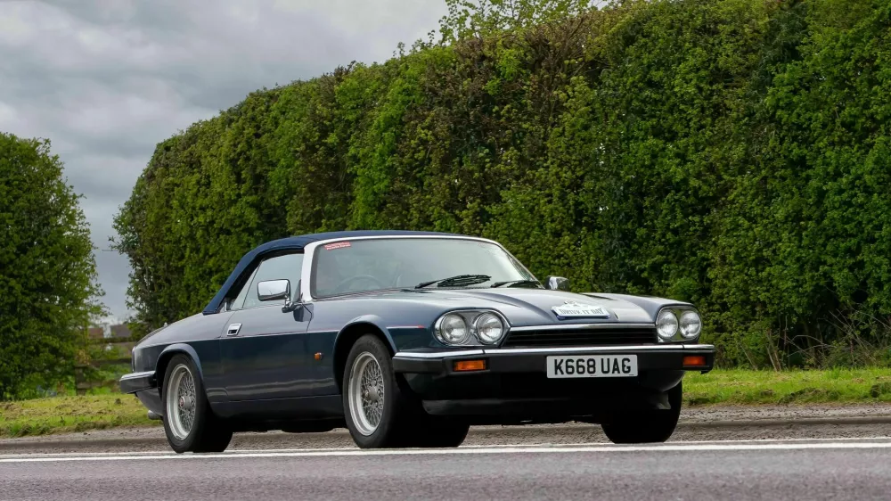 2PPWFRB Bicester,Oxon,UK - April 23rd 2023. 1992 JAGUAR XJS car travelling on an English country road
