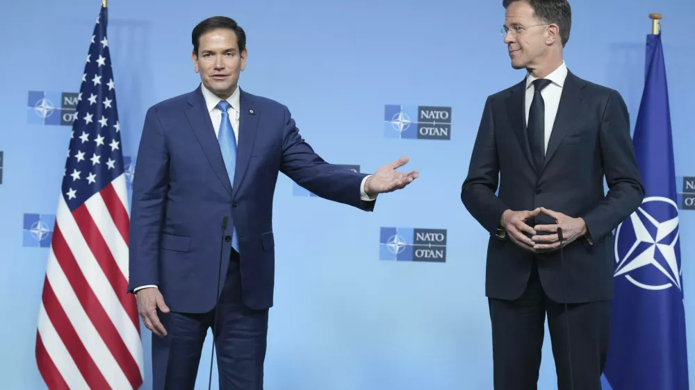 U.S. Secretary of State Marco Rubio, left, meets with NATO Secretary General Mark Rutte on the sidelines of a NATO foreign ministers meeting at NATO headquarters in Brussels, Thursday, April 3, 2025. (AP Photo/Jacquelyn Martin, Pool)