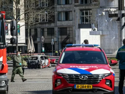 AMSTERDAM - A car burned out on Dam Square near the National Monument. The driver was injured. ANP DINGENA MOL netherlands out - belgium out,Image: 982953287, License: Rights-managed, Restrictions: *** World Rights Except Belgium, France, Germany, The Netherlands, and The UK *** BELOUT DEUOUT FRAOUT GBROUT NDLOUT, Model Release: noFoto: Profimedia