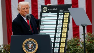 FILE PHOTO: U.S. President Donald Trump delivers remarks on tariffs in the Rose Garden at the White House in Washington, D.C., U.S., April 2, 2025. REUTERS/Carlos Barria    TPX IMAGES OF THE DAY/File Photo/File Photo