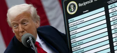 U.S. President Donald Trump delivers remarks on tariffs in the Rose Garden at the White House in Washington, D.C., U.S., April 2, 2025. REUTERS/Carlos Barria