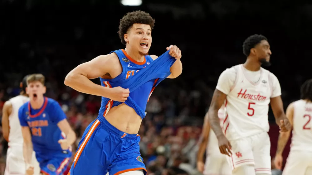 Apr 7, 2025; San Antonio, TX, USA; Florida Gators guard Walter Clayton Jr. (1) celebrates after winning the national championship game of the Final Four of the 2025 NCAA Tournament at the Alamodome. Mandatory Credit: Bob Donnan-Imagn Images