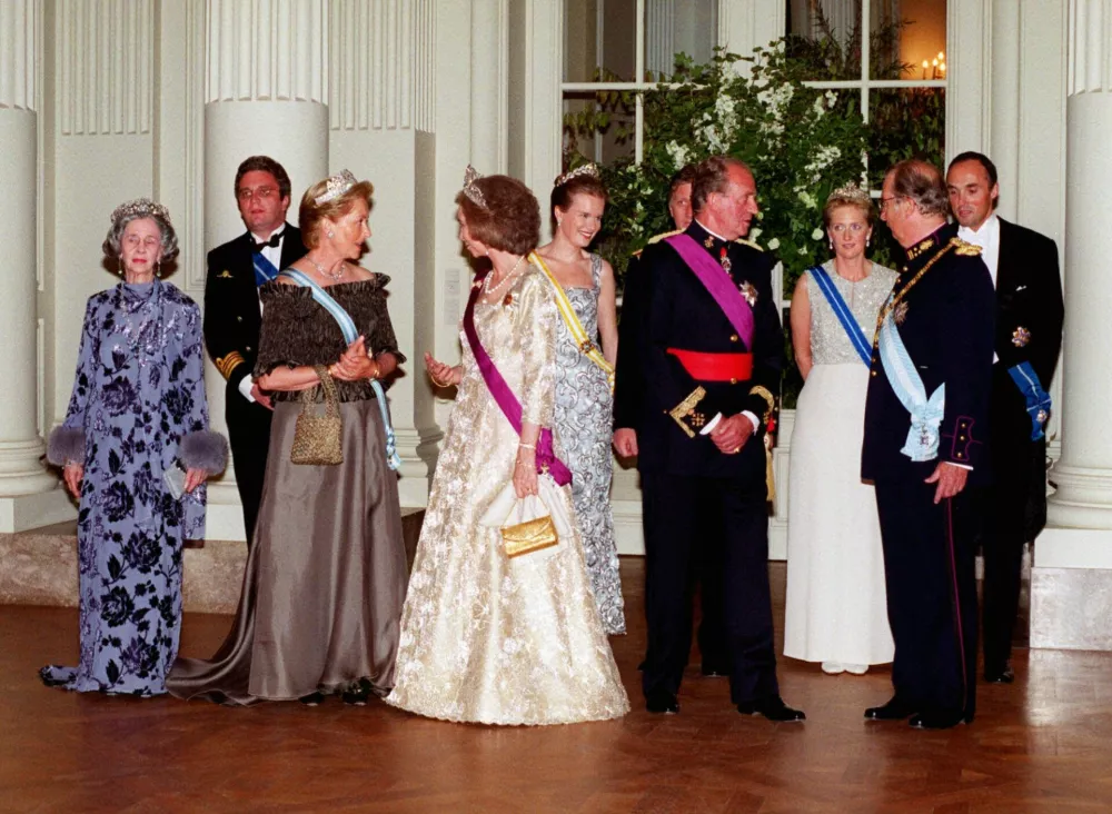 Members of Belgium and Spain's royal families engage in conversation late Tuesday evening, May 16, 2000 at the Royal Palace in Laeken. Members are from left, Belgium's Queen Fabiola, Prince Laurent, rear, Queen Paola, Spain's Queen Sofia, Belgium's Princess Mathilde and Prince Philippe, rear, Spain's King Juan Carlos, Belgium's Princess Astrid, King Albert, and Prince Lorenz. (AP Photo/Thierry Charlier)