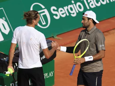 Tennis - ATP Masters 1000 - Monte Carlo Masters - Monte Carlo Country Club, Roquebrune-Cap-Martin, France - April 8, 2025 Italy's Matteo Berrettini shakes hands with Germany's Alexander Zverev after winning his round of 64 match REUTERS/Manon Cruz