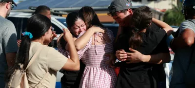 People react at the site where the roof of the Jet Set nightclub collapsed, in Santo Domingo, Dominican Republic, April 8, 2025. REUTERS/Erika Santelices   TPX IMAGES OF THE DAY