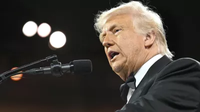 President Donald Trump speaks at the National Republican Congressional Committee (NRCC) dinner at the National Building Museum in Washington, Tuesday, April 8, 2025. (Pool via AP)