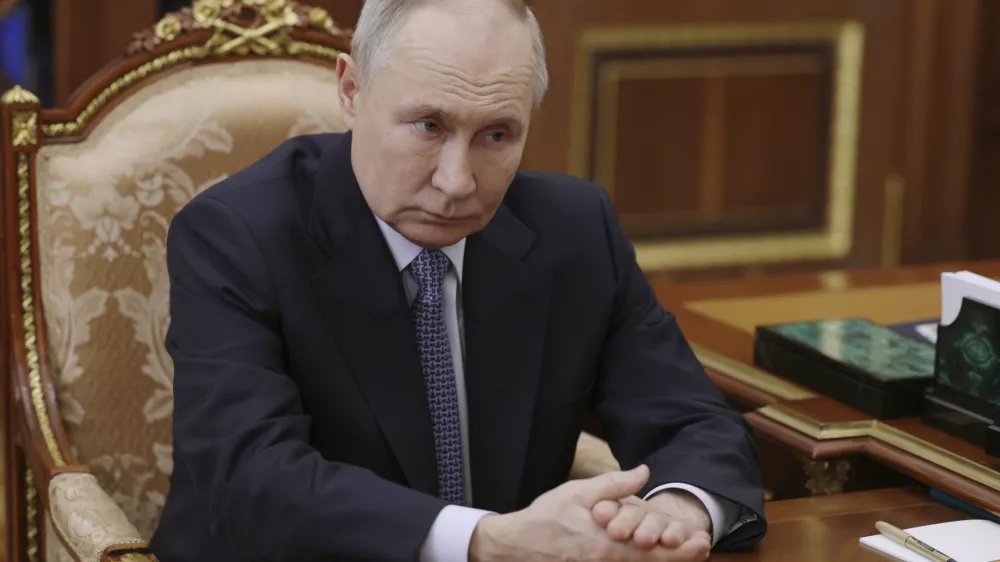 Russian President Vladimir Putin listens to Director General of the Agency for Strategic Initiatives (ASI) Svetlana Chupsheva during their meeting at the Kremlin in Moscow, Russia, on Wednesday, April 9, 2025. (Vyacheslav Prokofyev, Sputnik, Kremlin Pool Photo via AP)