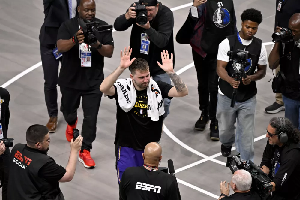 Apr 9, 2025; Dallas, Texas, USA; Los Angeles Lakers guard Luka Doncic (77) walks off the court after the game against the Dallas Mavericks at the American Airlines Center. Mandatory Credit: Jerome Miron-Imagn Images