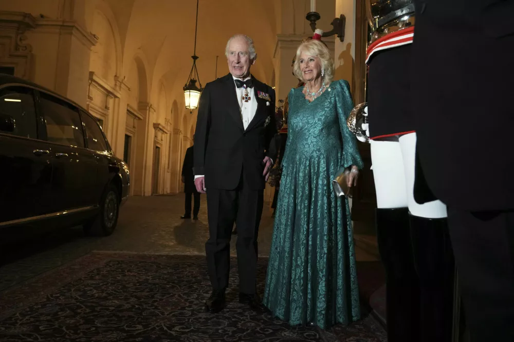 Britain's King Charles III and Queen Camilla arrive for an official dinner with Italy's President Sergio Mattarella at the Quirinale Presidential Palace in Rome, Wednesday, April 9, 2025. (AP Photo/Andrew Medichini)
