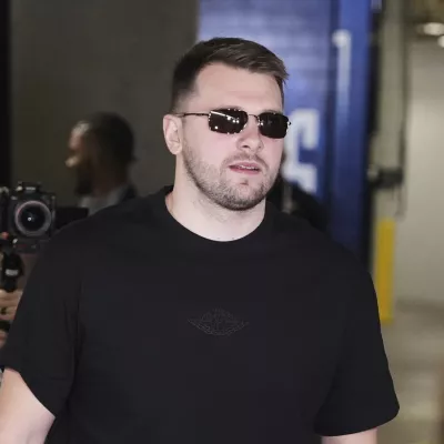 Los Angeles Lakers' Luka Doncic arrives at American Airlines Center for an NBA basketball game against the Dallas Mavericks in Dallas, Wednesday, April 9, 2025. (AP Photo/LM Otero)