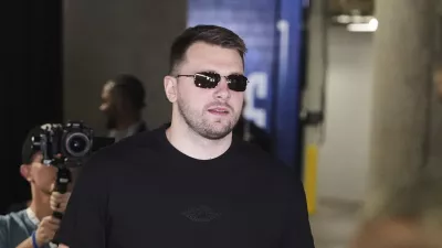 Los Angeles Lakers' Luka Doncic arrives at American Airlines Center for an NBA basketball game against the Dallas Mavericks in Dallas, Wednesday, April 9, 2025. (AP Photo/LM Otero)