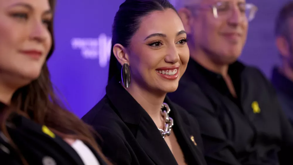 Israel's Eurovision 2025 representative and survivor of the October 7, 2023 attack, Yuval Raphael, attends a press conference after premiering her song 'New Day Will Rise' in Tel Aviv, Israel March 9, 2025. REUTERS/Ronen Zvulun