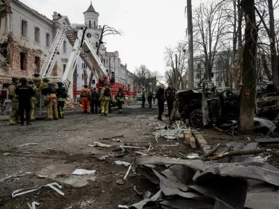 Members of emergency services work at the site of a Russian missile strike, amid Russia's attack on Ukraine, in Sumy, Ukraine April 13, 2025. REUTERS/Sofiia Gatilova